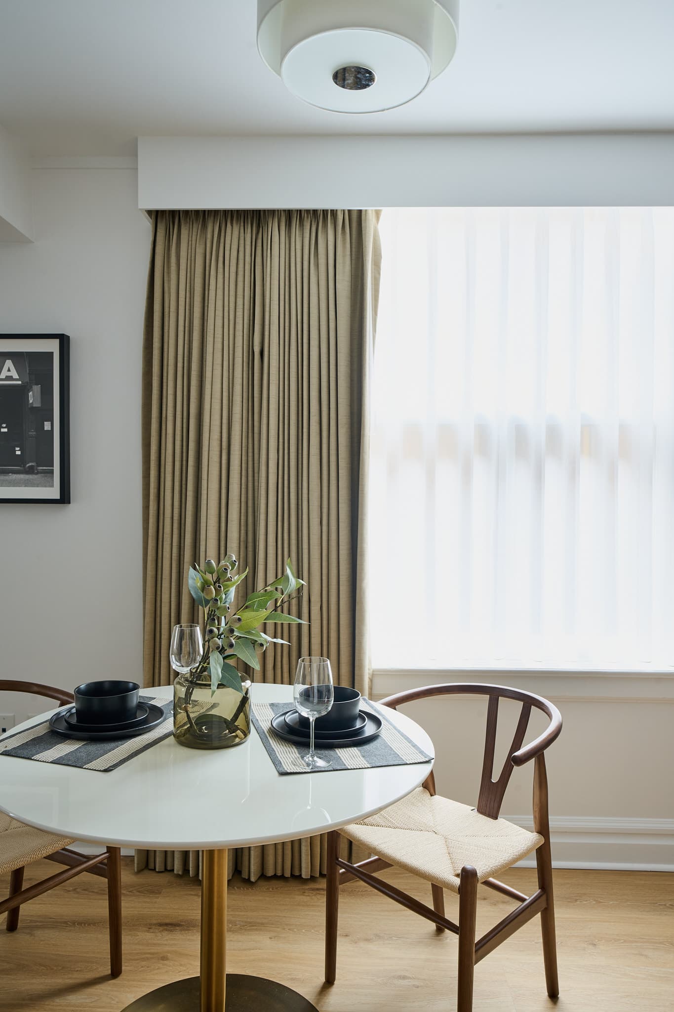 Table set for two in a Houston apartment at Rusk House Serviced Apartments in Houston