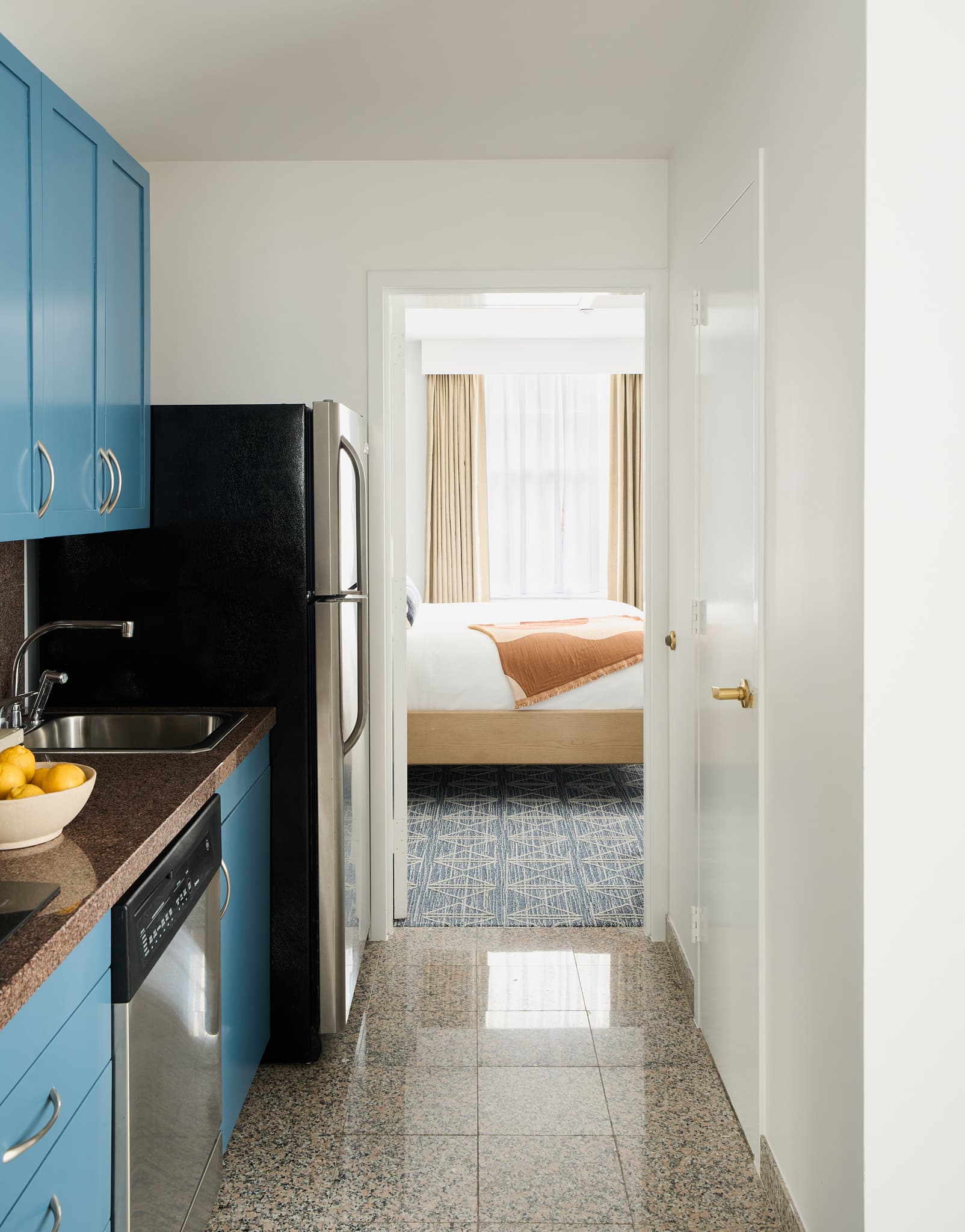 View of bedroom from kitchen at Rusk House Serviced Apartments